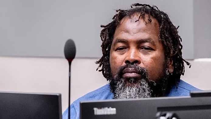 Le commandant du groupe rebelle Seleka, Mahamat Said Abdel Kani, dans une salle d'audience de la Cour pénale internationale de La Haye, le 23 septembre 2026. © AP